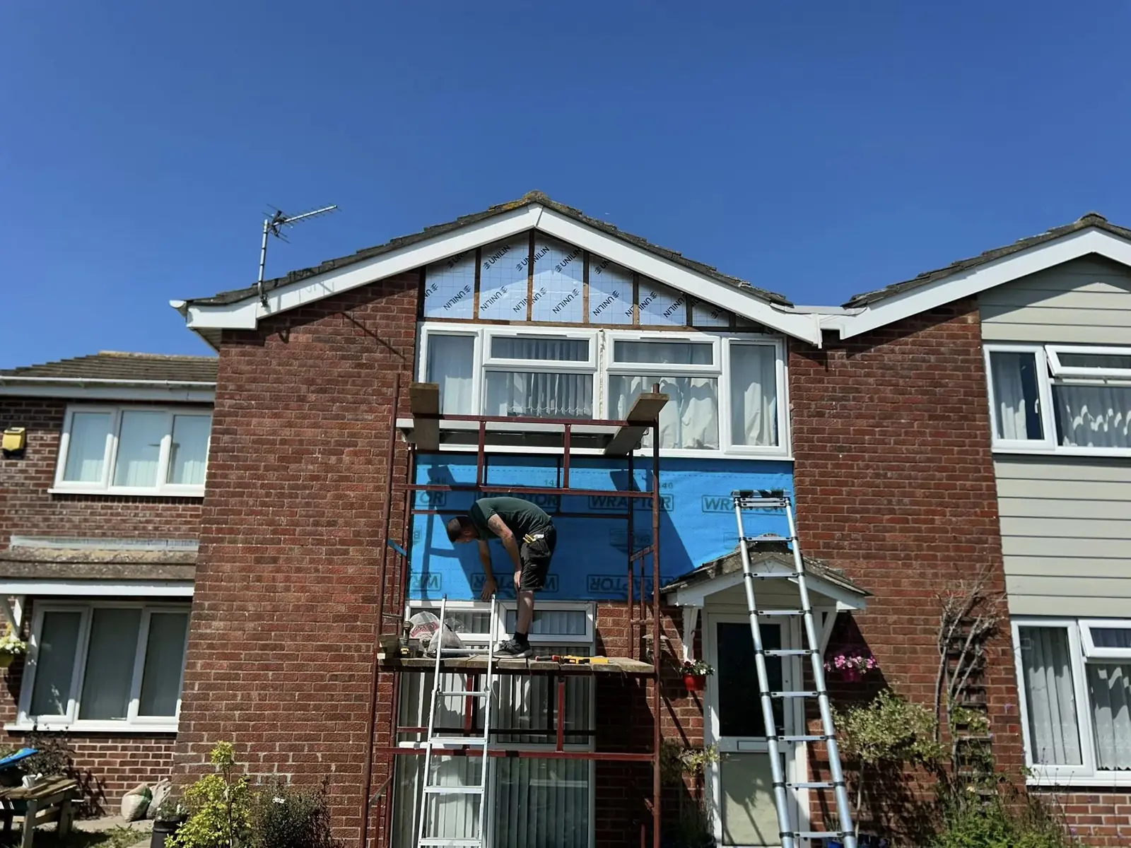 Installation work on a glazed rear extension