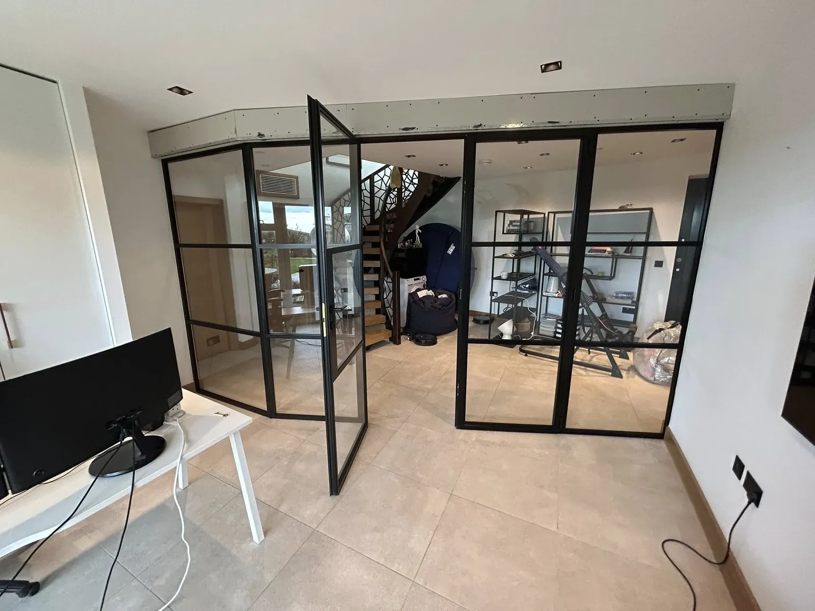 Black-framed internal glazed double doors